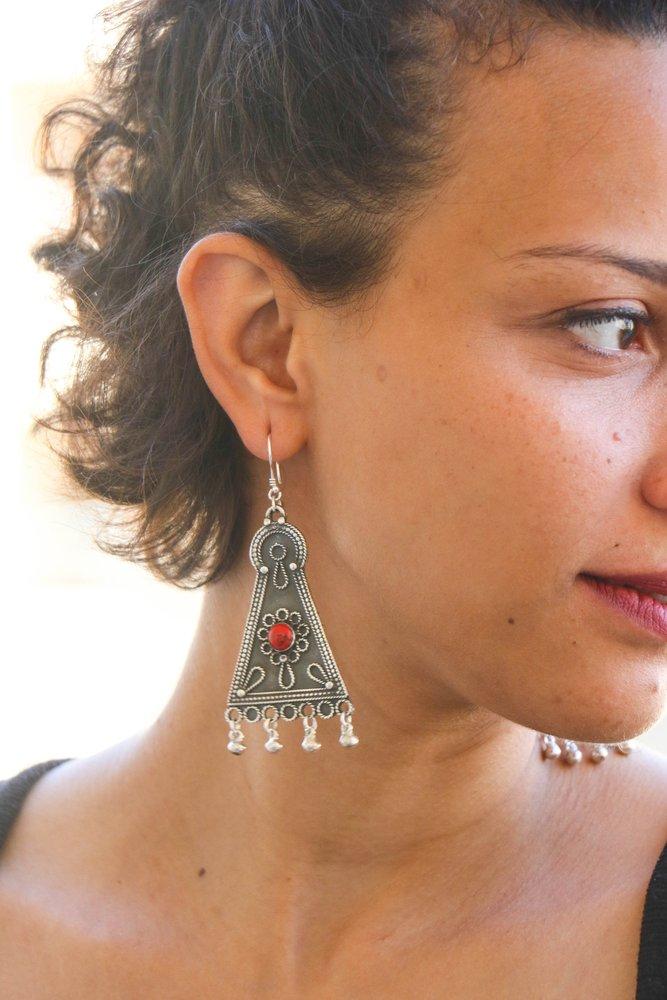 Bedouin Earring - This silver piece is a part of two long pendants (saffafat) with coral or turquoise stone that used to hang from the sides of a Palestinian headdress (shatweh) in Bethlehem and Jerusalem, 19th century.